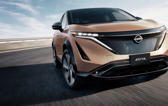 Nissan ARIYA front view focus on wheel cornering | Nissan of Fort Myers in Fort Myers FL